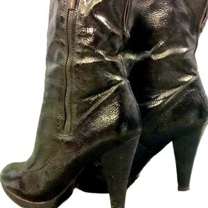 Black patent leather boots by Colin Stewart